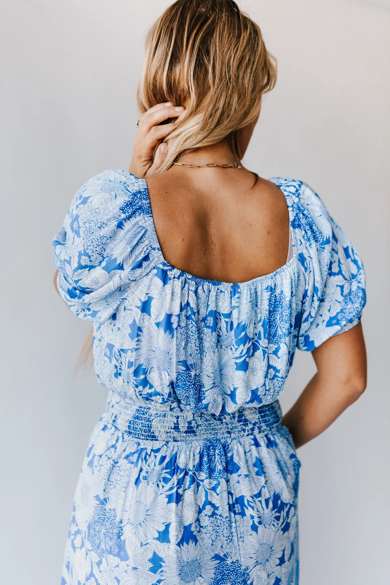 The Challis Smocked Detail Dress in Blue Floral